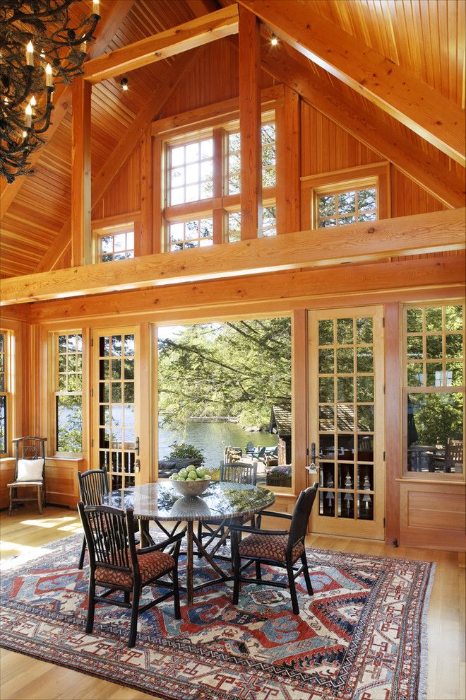 Atrium Windows and Doors for a Rustic Dining Room with a Indoor Outdoor and Woodland Point Great Room by Carl Vernlund