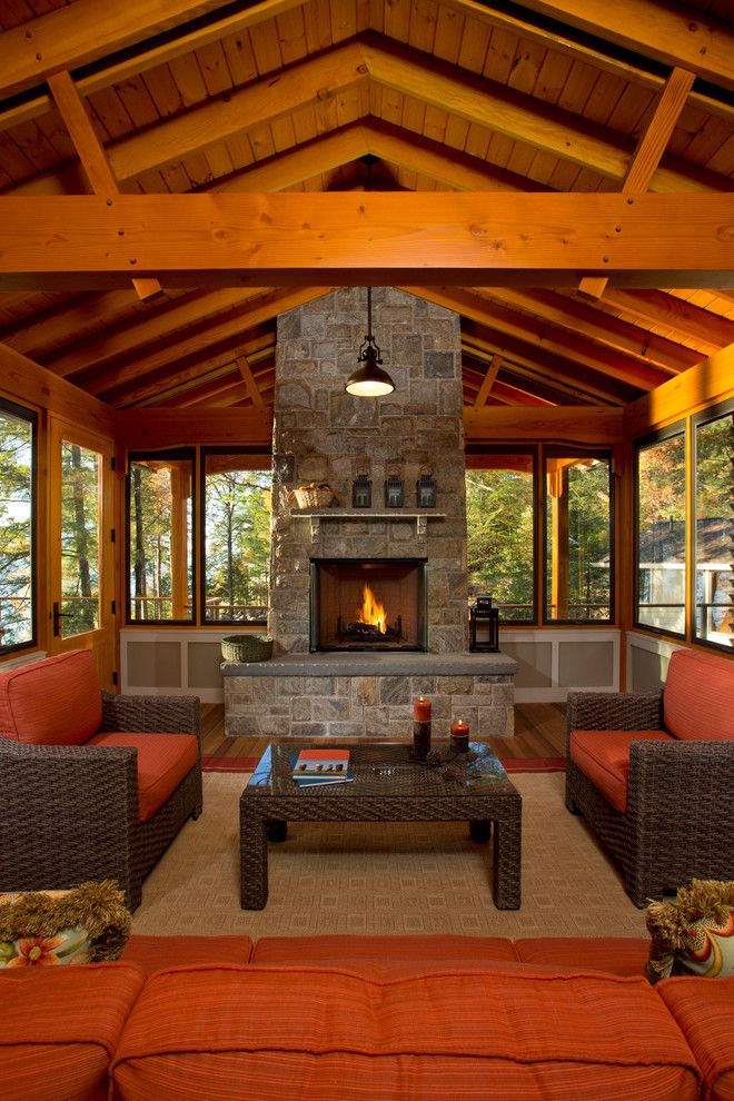 Atrium Windows and Doors for a Rustic Porch with a Black Pendant and Bolton Landing Modern Cabin by Teakwood Builders, Inc.