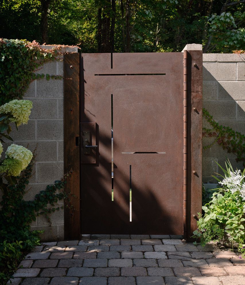 Atwal Eye Care for a Contemporary Landscape with a Corten Steel and Lake House by Castanes Architects Ps