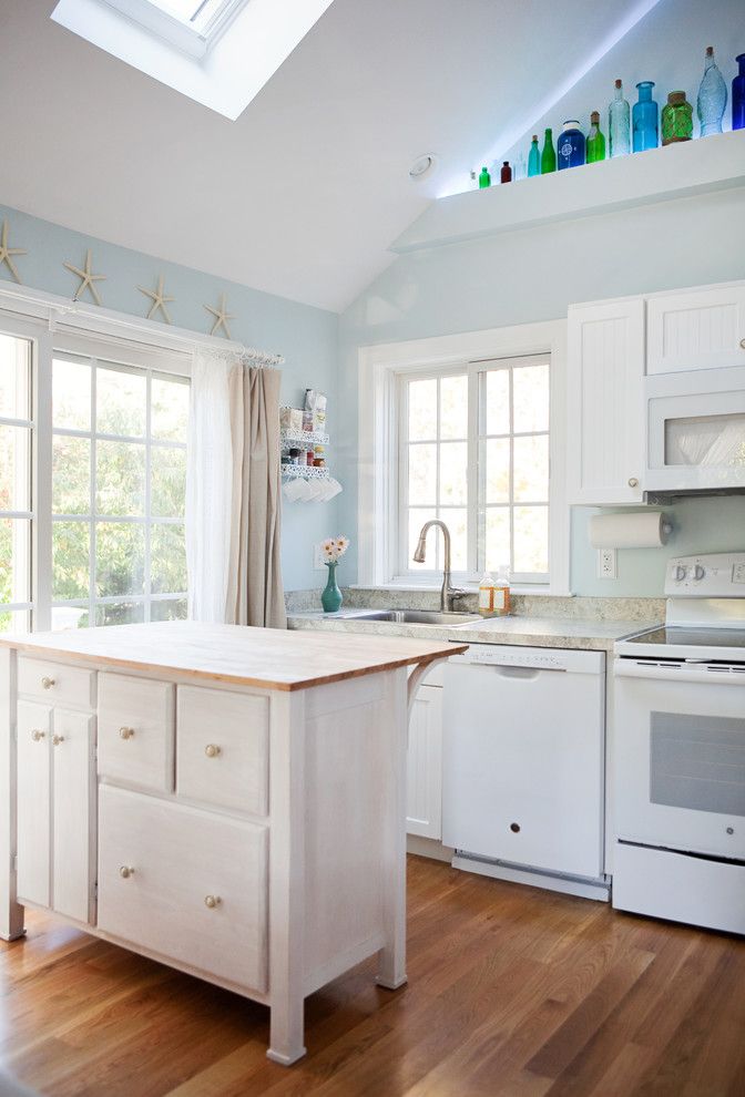 Avanti Furniture for a Beach Style Kitchen with a Wood Countertop and Chatham Addition by Patriot Builders Inc