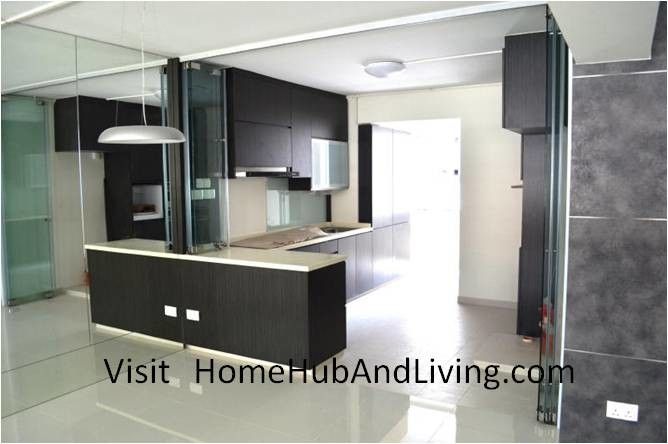 Axia Home Loans for a Contemporary Spaces with a Car Porch and Stylish Designed Modern Kitchen (Counter Top Island) with Frameless Door System by Home Hub and Living