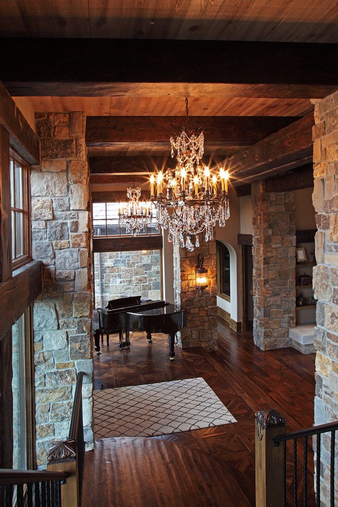 Baby Grand Piano Dimensions for a Rustic Entry with a Interior Exposed Stone Wall and Old World Deer Lodge Estate by James Mcneal Architecture and Design