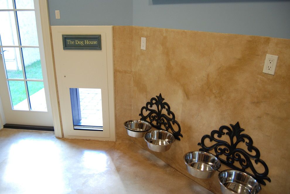 Baby Wiener Dogs for a Mediterranean Laundry Room with a Door and South Jacksonville by Cote Renard Architecture