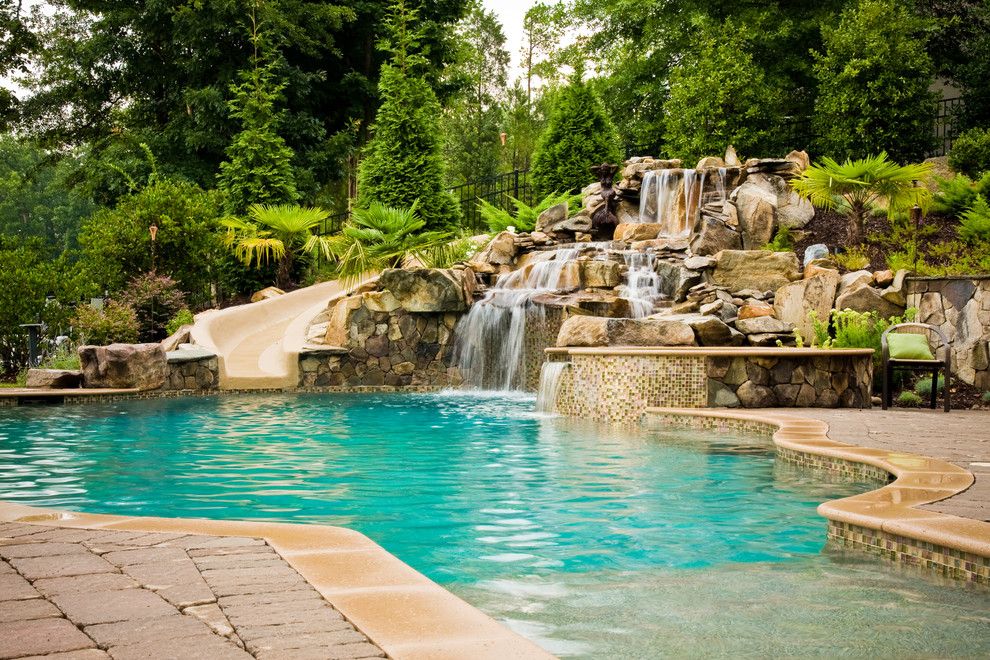 Ballantyne Spa for a Tropical Spaces with a Hot Tub and Ballantyne Tropical Oasis by Coogan's Landscape Design