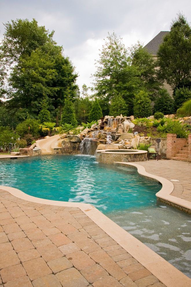 Ballantyne Spa for a Tropical Spaces with a Tropical Pool and Ballantyne Tropical Oasis by Coogan's Landscape Design