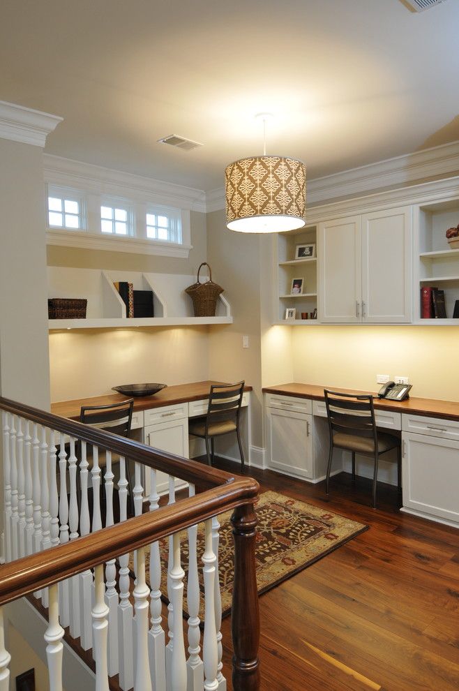 Baluster Spacing for a Traditional Home Office with a Open Shelves and Revere House by Designstorms Llc