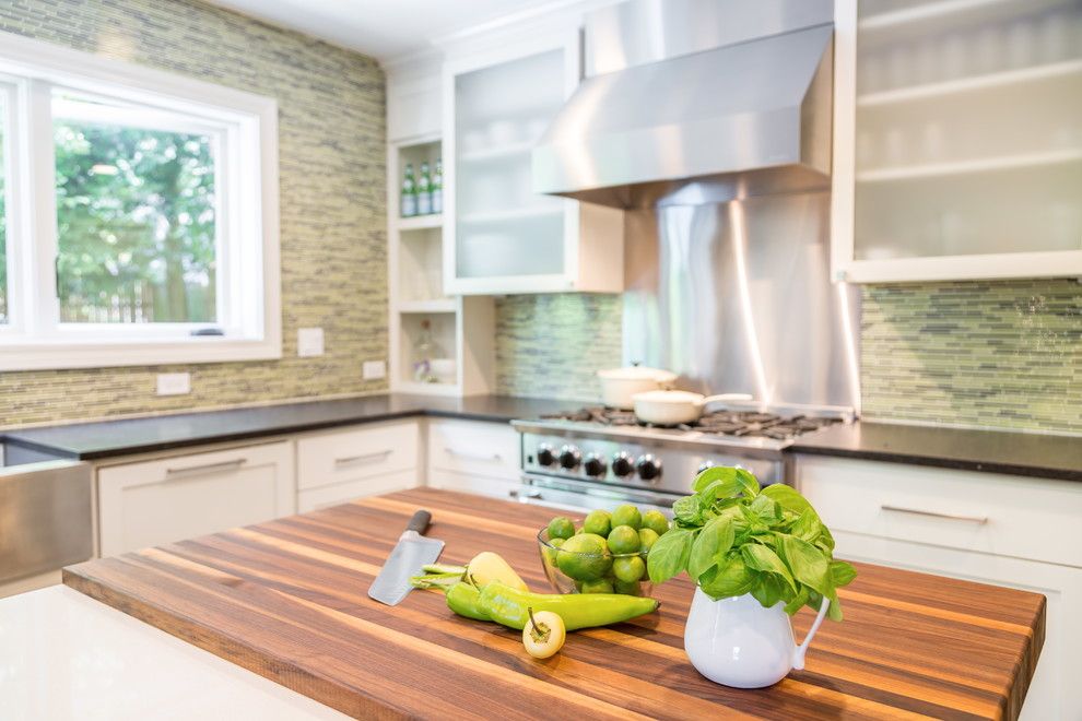 Bamboo Cutting Board Care for a Transitional Spaces with a Sliding Barn Doors and Kitchen with Industrial Touches by Design Harmony