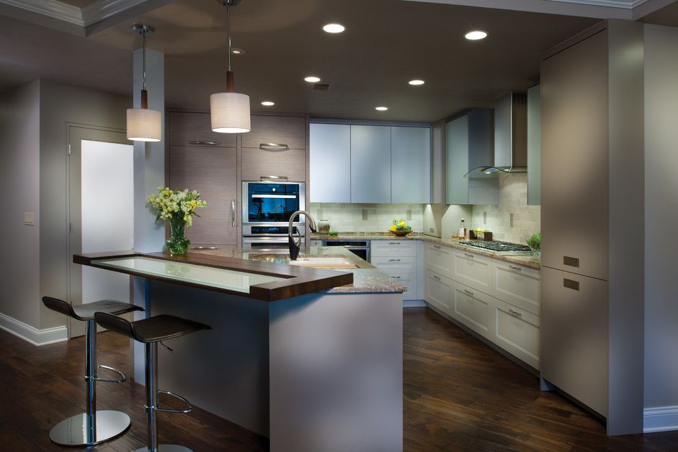 Bar Method Oakland for a Modern Kitchen with a Dark Wood Floor and Thermador by Thermador Home Appliances