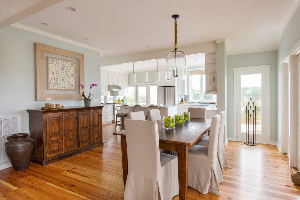 Barstol for a Beach Style Dining Room with a Hanging Pendants and Marsh Front Home by Amy Trowman Design