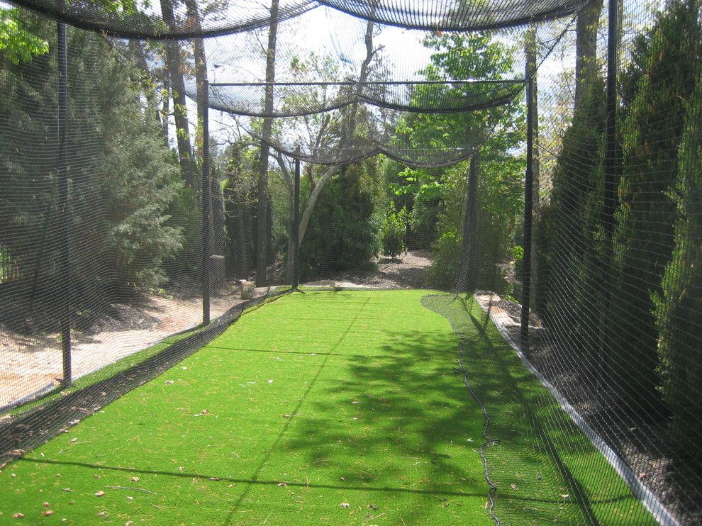 Batting Cage Miami for a Eclectic Landscape with a Nylon Netting and Cabana @ the Manor, Milton, Ga by Vesta Homes, Inc.