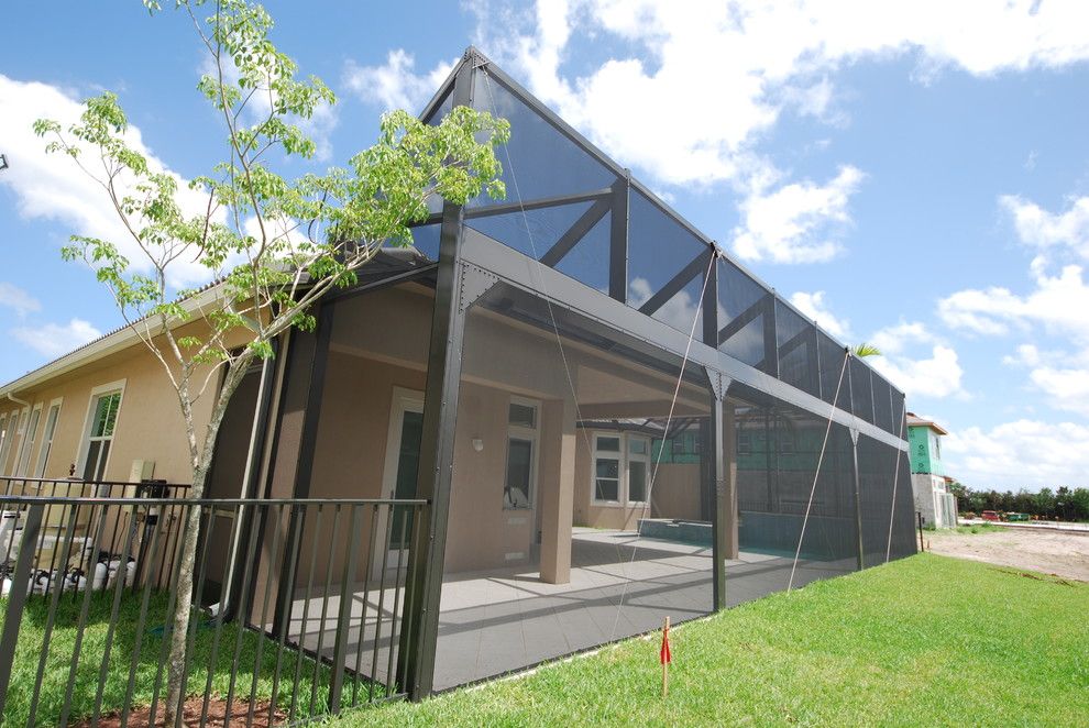 Batting Cages Miami for a Contemporary Patio with a Modern Screen and Residential Pool Enclosure by Coastal Screen and Rail