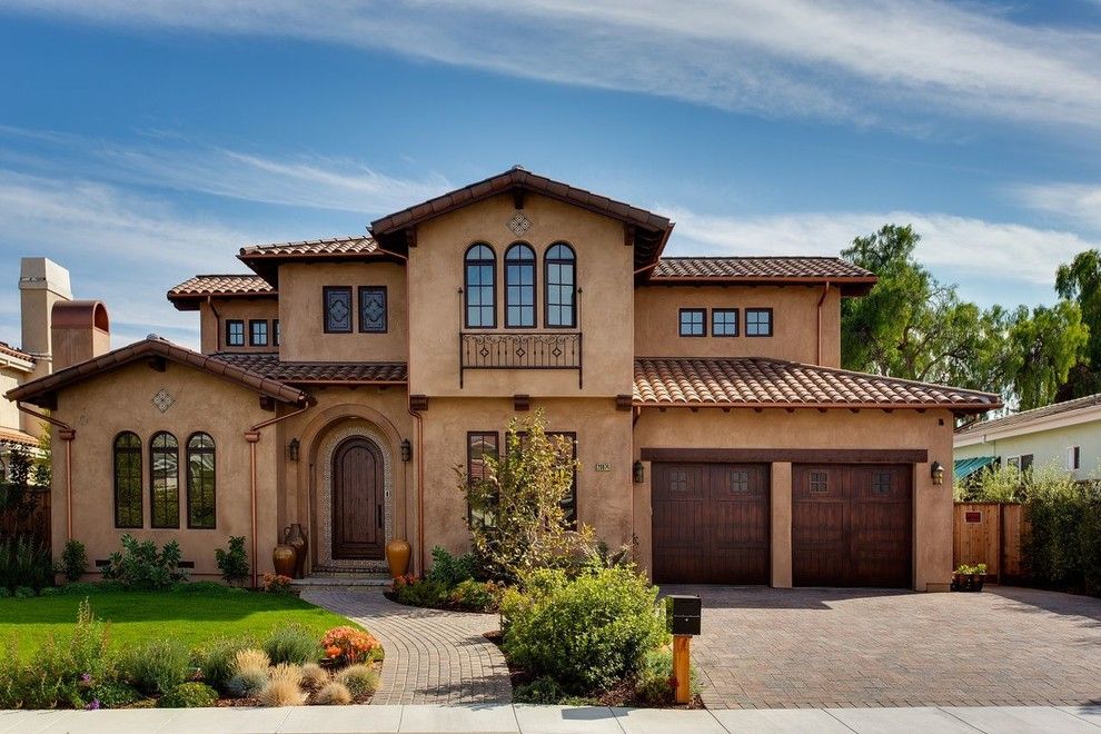 Beazer Homes Reviews for a Mediterranean Exterior with a Arched Windows and Exterior Remodels by Ritz Design Build