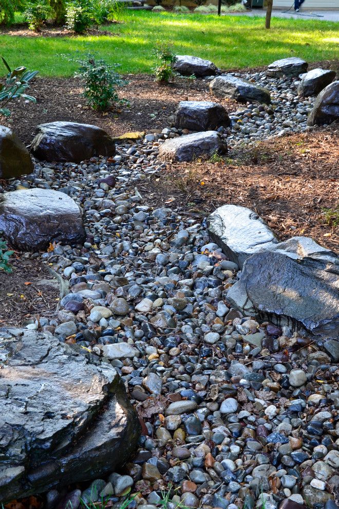 Belgard Hardscapes for a Traditional Landscape with a Patio and California Front Hardscapes by the Sharper Cut, Inc. Landscapes