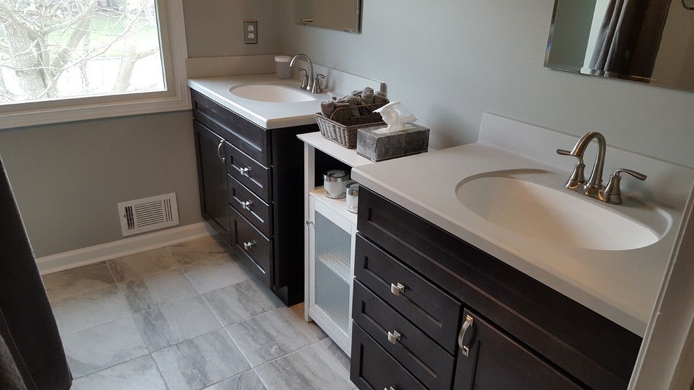 Bell Tower Hotel Ann Arbor for a Traditional Bathroom with a Cast Iron Bathtub and Ann Arbor Dual Vanity Guest Bath by Exemplar Carpentry & Home Repair