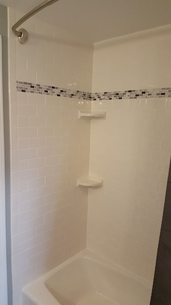Bell Tower Hotel Ann Arbor for a Traditional Bathroom with a Curved Hotel Shower Rods and Ann Arbor Dual Vanity Guest Bath by Exemplar Carpentry & Home Repair