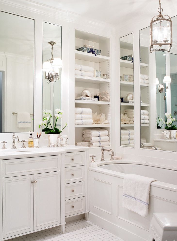 Best Way to Unclog a Toilet for a Traditional Bathroom with a Built in Towel Shelves and Park Avenue Apartment in Rosario Candela Building by Studio 511