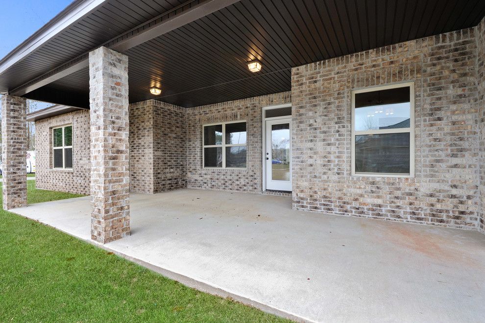 Boral Bricks for a Contemporary Exterior with a Vinyl Soffit Fascia and the Allen by Elliott Homes Llc