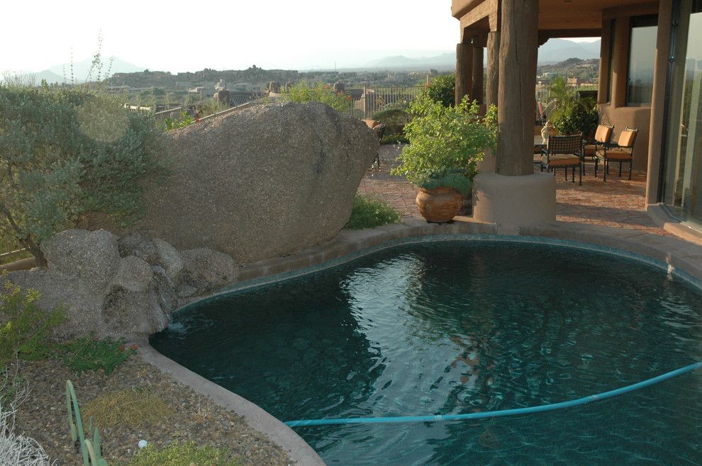 Boulders Golf for a Rustic Pool with a Elevator and Troon Scottsdale Pueblo Style Built Into the Boulders by Darling Residential Architecture and Design