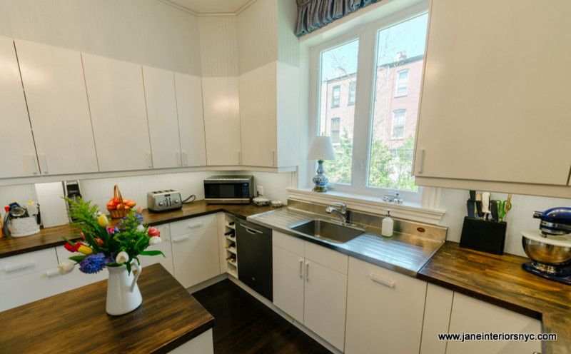 Bowling Alleys in Nyc for a Transitional Kitchen with a Kitchen Island and Blue and White Kitchen by Jane Interiors Nyc