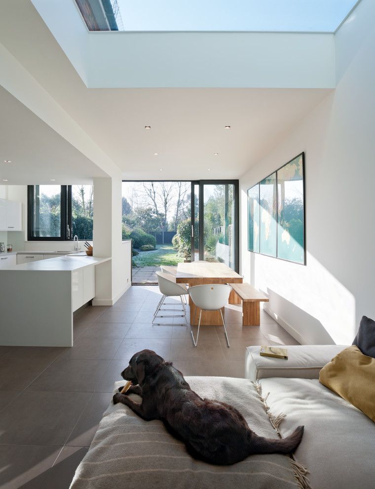 Bowmansdale Family Practice for a Contemporary Kitchen with a Medium Wood Dining Table and Surrey Extension by Moxon Architects
