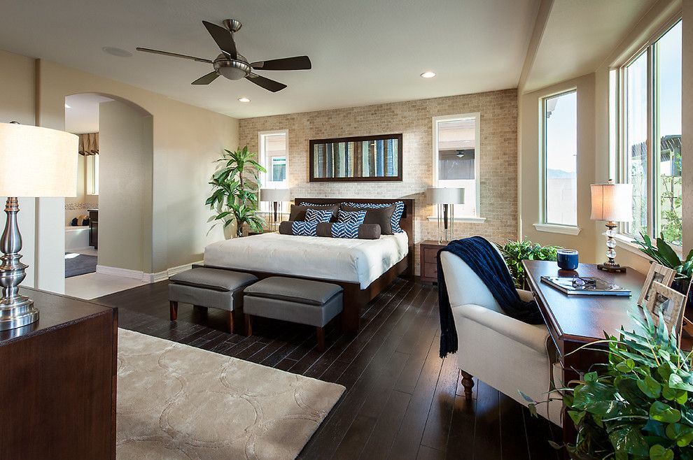 Brick Wall Waterfall for a Traditional Bedroom with a Ceiling Fan and Arch Crossing at Bridges at Gilbert by Maracay Homes Design Studio