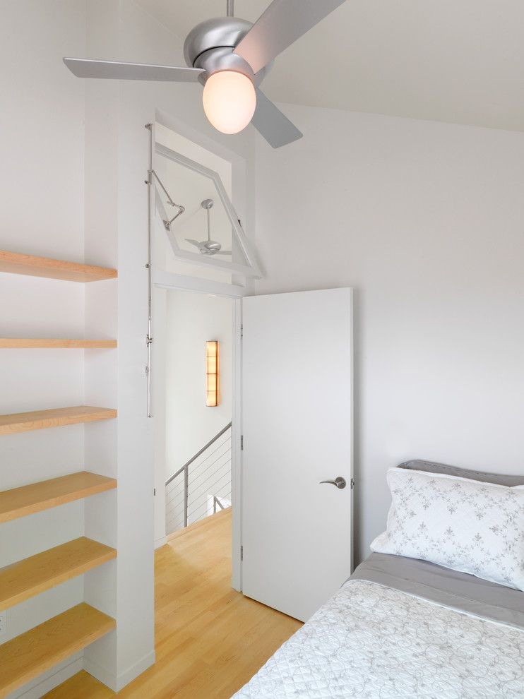 Brosco Doors for a Contemporary Bedroom with a White Walls and Vermont Lake Home by Elizabeth Herrmann Architecture + Design