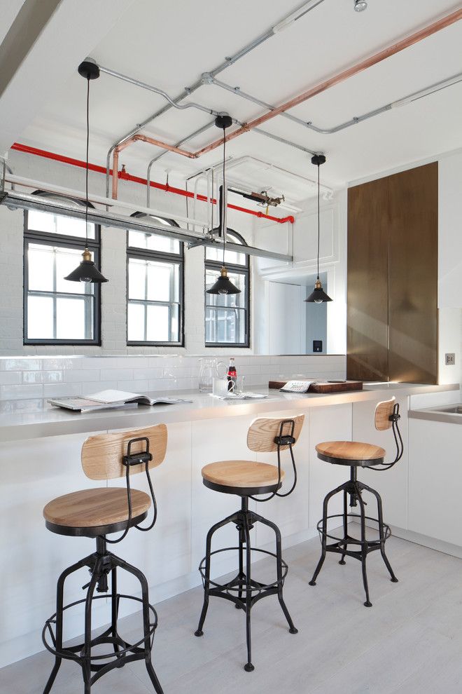 Broward Factory Service for a Industrial Kitchen with a Soho Loft and Luxury Loft Apartment Kitchen by Oliver Burns