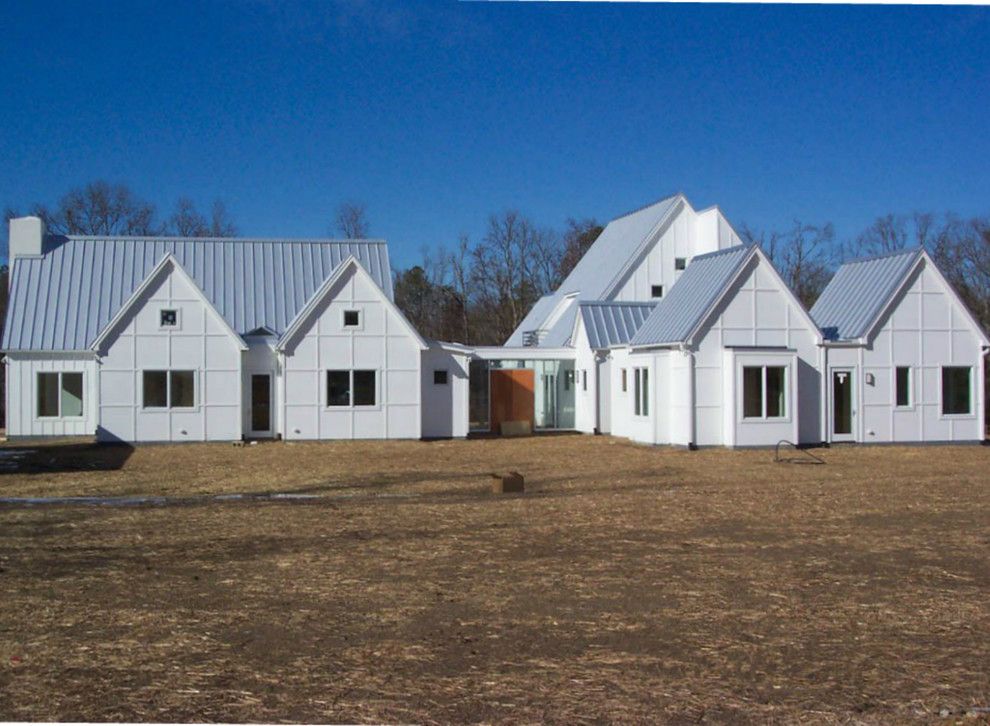 Buildex for a Modern Exterior with a Metal Roofing and Modern Take on Carrboro Farmhouse by Buildex