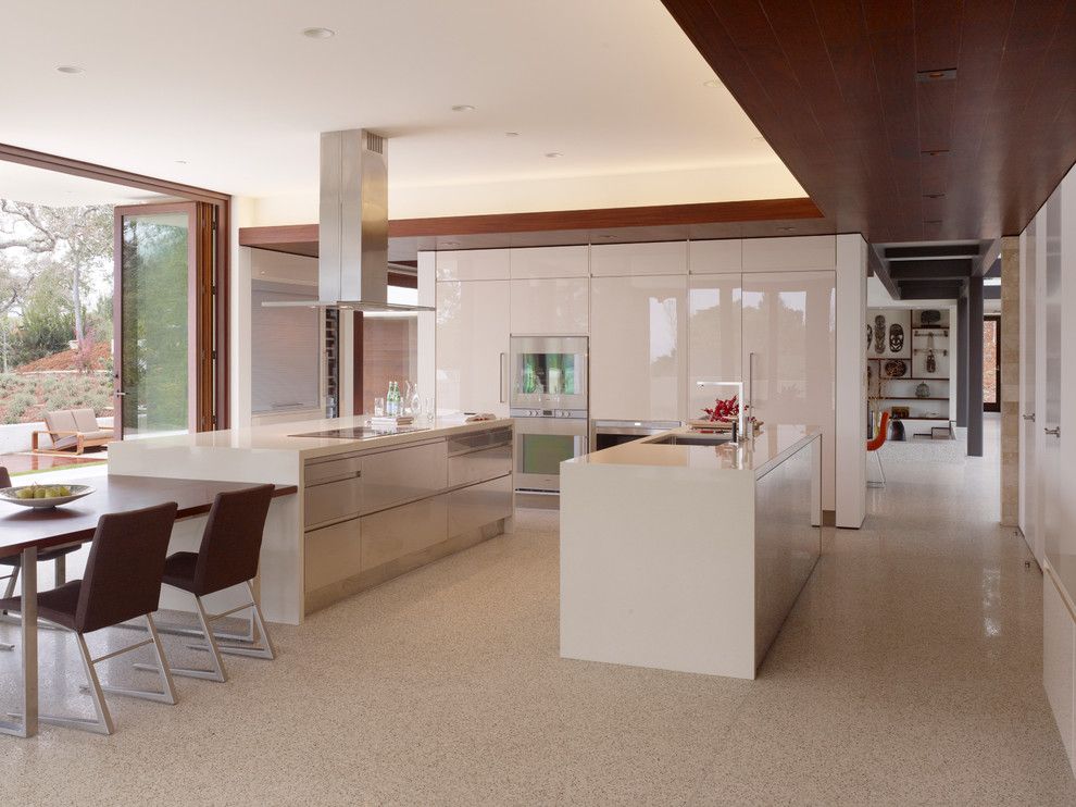 Bulkheads for a Modern Kitchen with a Archlinea Cabinetry and Modern Peninsula Estate by Lencioni Construction