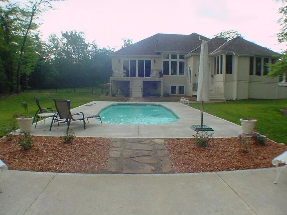 Buster Crabbe Pools for a Traditional Pool with a Back of House and Hardscape Projects by Debbie's Lawn Busters