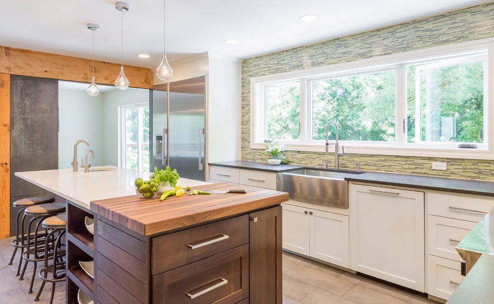 Butcher Block Nyc for a Transitional Kitchen with a Stainless Farmhouse Sink and Kitchen with Industrial Touches by Design Harmony