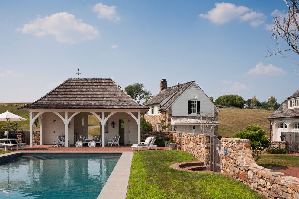 Cabot House Furniture for a Farmhouse Pool with a Bonnet Roof and Radnor House by E. B. Mahoney Builders, Inc.