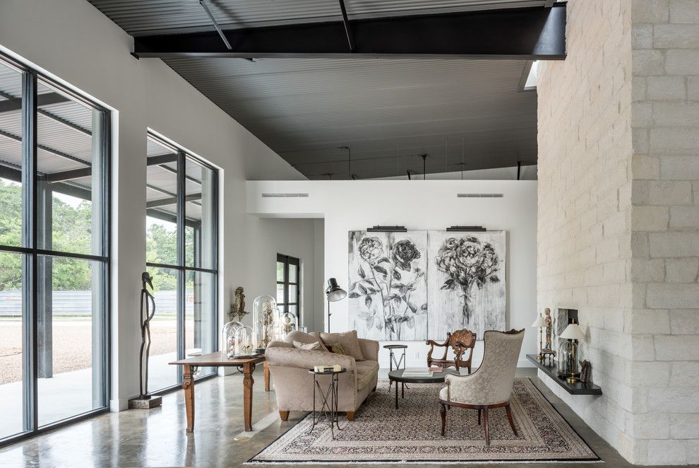 Canopy Houston for a Industrial Living Room with a Concrete Floor and Delz Warehouse by Content Architecture