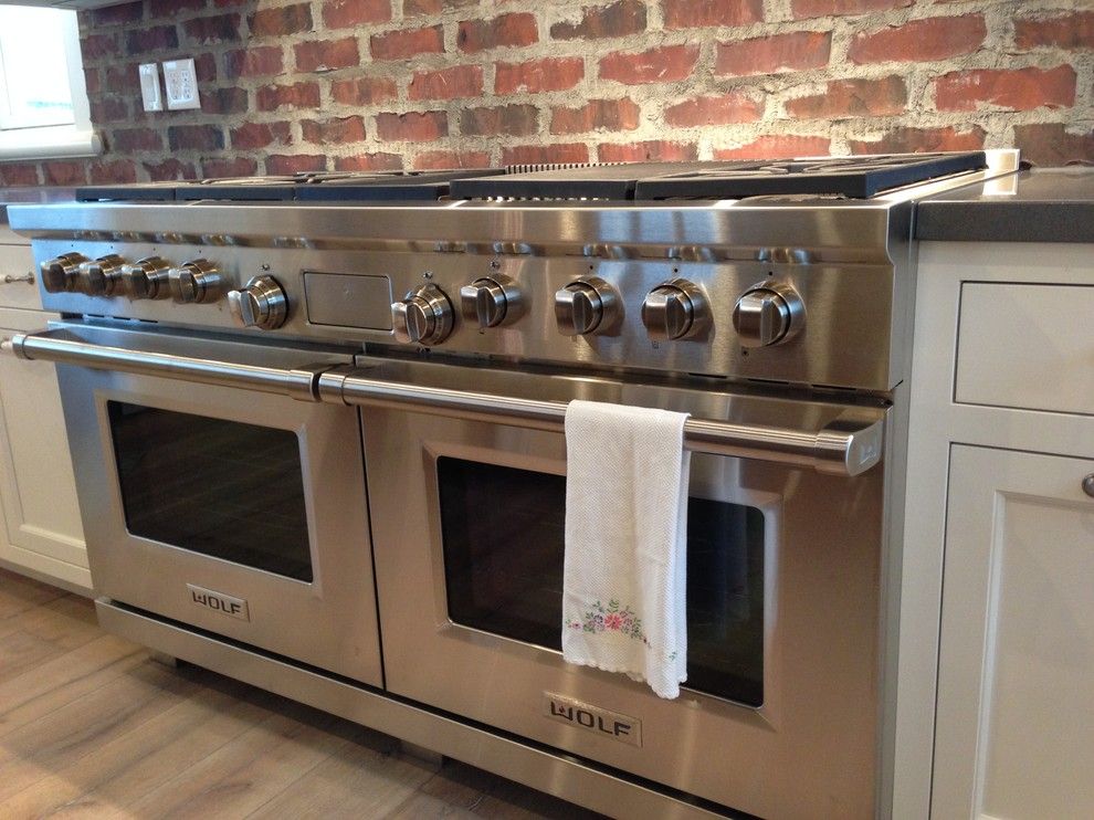 Castle Combe for a Farmhouse Kitchen with a Tile Backsplash and Utah Valley Parade of Home Kitchen Design by Titan Homes