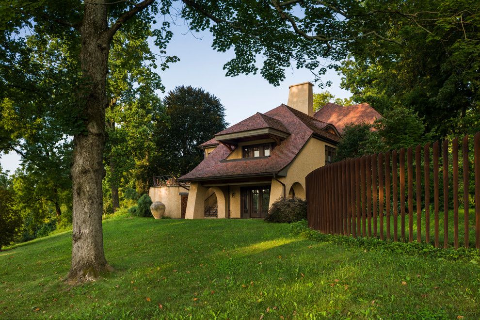 Cat5e vs Cat6 for a Transitional Exterior with a Grass and Cor Ten Cattails Sculptural Fence by Archer & Buchanan Architecture, Ltd.