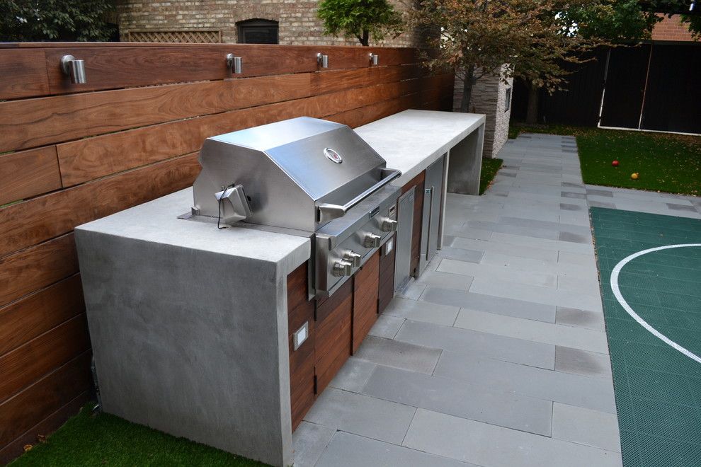 Ceco Concrete Construction for a Modern Landscape with a Outdoor Kitchen and Modern Landscape by Chicago Roof Deck & Garden