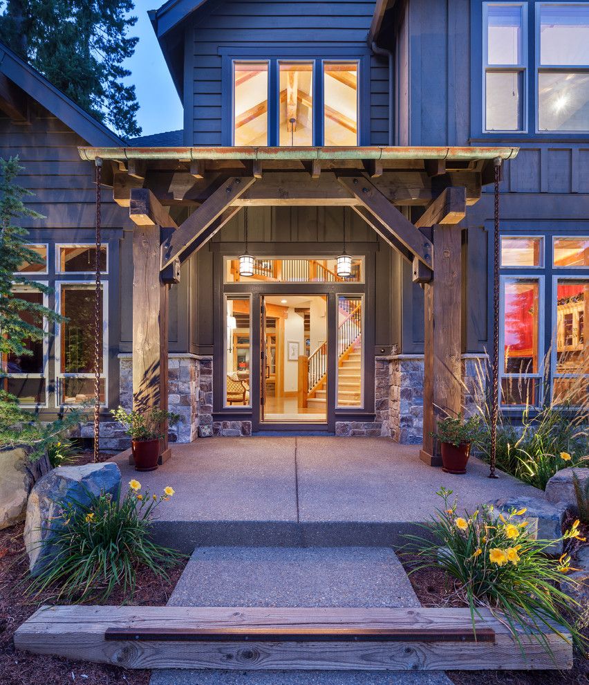 Ceco Concrete Construction for a Rustic Entry with a Lodge and Sw Portland Custom Home by Micah Day Construction Inc.