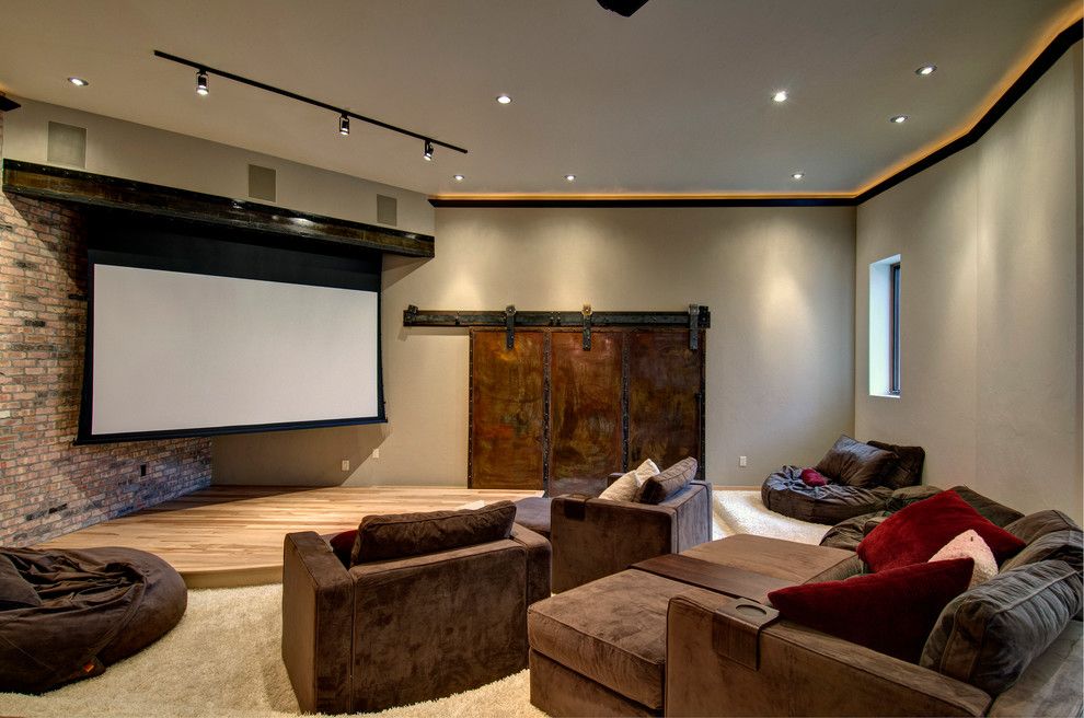 Champlin Movie Theater for a Contemporary Home Theater with a Brown Armchairs and Cliff Line Road     Golden Co by Jon Eady Photographer