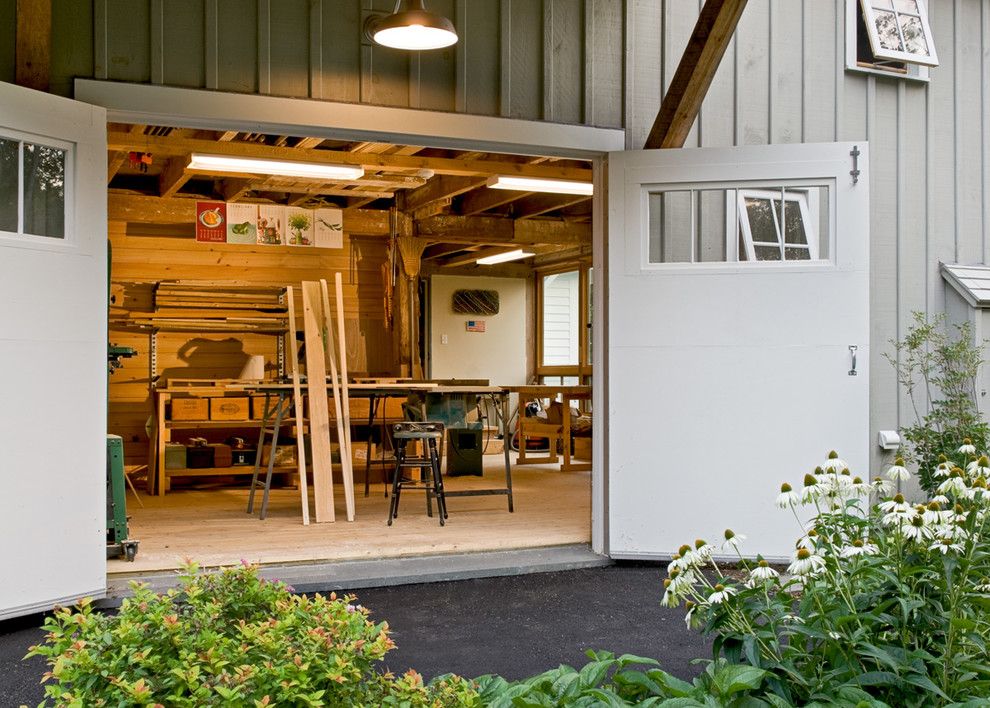 Chi Overhead Doors for a Farmhouse Shed with a Workshop and Workshop Doors by Whitten Architects