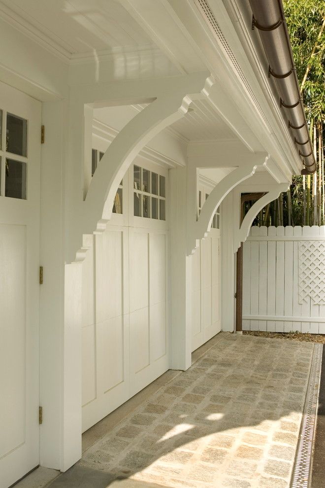 Chi Overhead Doors for a Traditional Garage with a Corbels and Custom Brackets by Lasley Brahaney Architecture + Construction