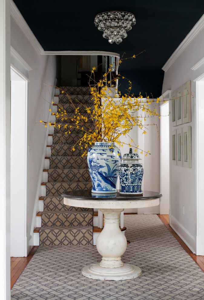 Chinese Fringe Flower for a Traditional Entry with a Blue and White Ceramic Vase and Bethesda Family Home by Breeze Giannasio Interiors