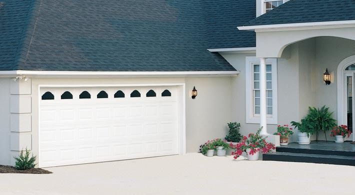 Chinese Fringe Flower for a Traditional Garage with a Exterior and Raised Panel by Empire Overhead Doors, Llc