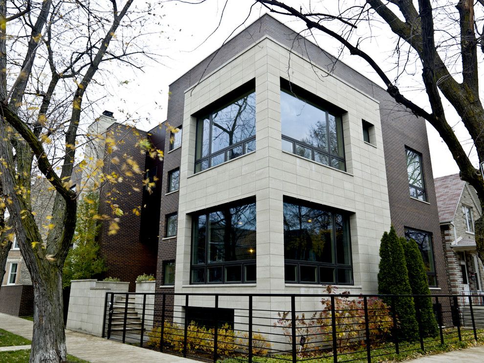 Cinder Block Dimensions for a Modern Exterior with a Metal Fence and Bucktown Beauty by Cynthia Lynn Photography