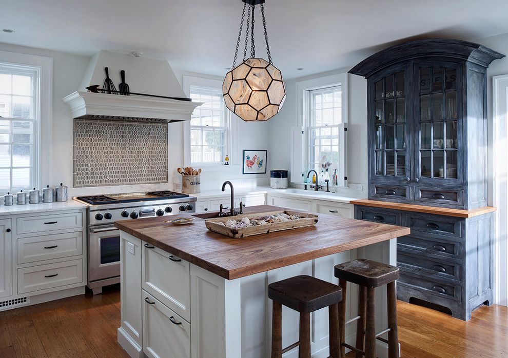 Cinder Block Dimensions for a Transitional Kitchen with a Blue Hutch and Nantucket Orange Street by Buckingham Interiors + Design Llc