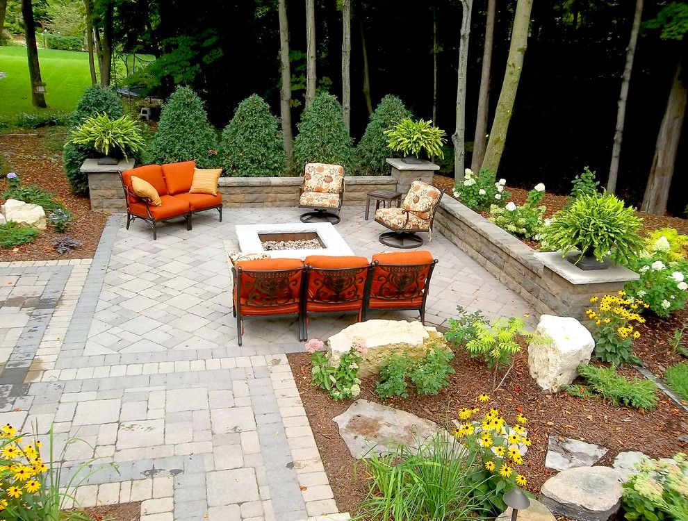 Cinder Block Retaining Wall for a Traditional Patio with a Mulch and Traditional Patio by Houzz.com