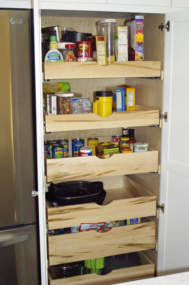 Clap Board for a Contemporary Kitchen with a Storage and Custom Pull Out Pantry Cabinet by Mathis Custom Remodeling