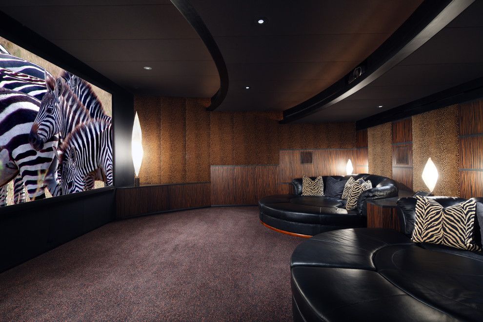 Clarksville Movie Theater for a Southwestern Home Theater with a Round Sofa and Palm Desert Theater by Deep River Partners