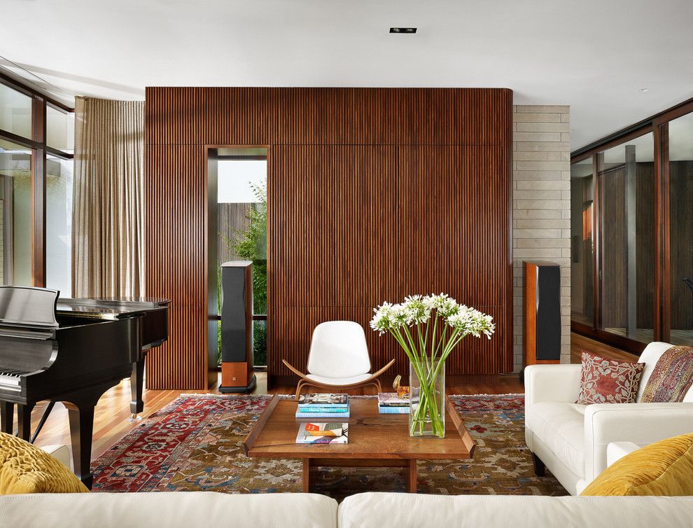 Classical Kusc for a Midcentury Family Room with a Chair and Lake View Residence by Alterstudio