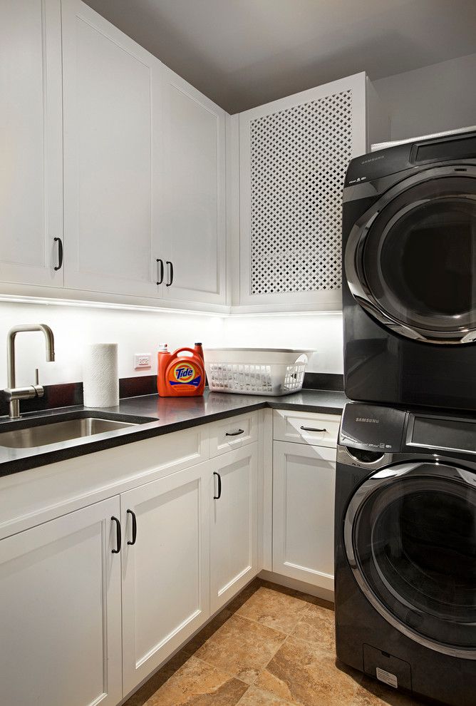 Cleaning Front Load Washer for a Traditional Laundry Room with a Brushed Stainless Faucet and Laundry Room by Tzs Design