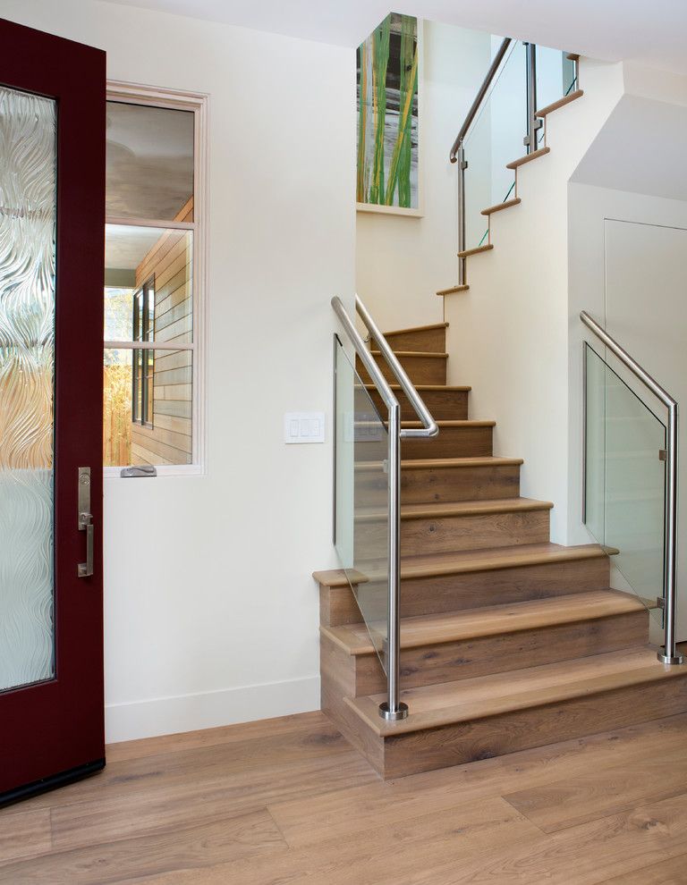 Cleaning Wood Floors with Vinegar for a Modern Staircase with a Wood Flooring and Modern Staircase by Simpsondesigngroup.com